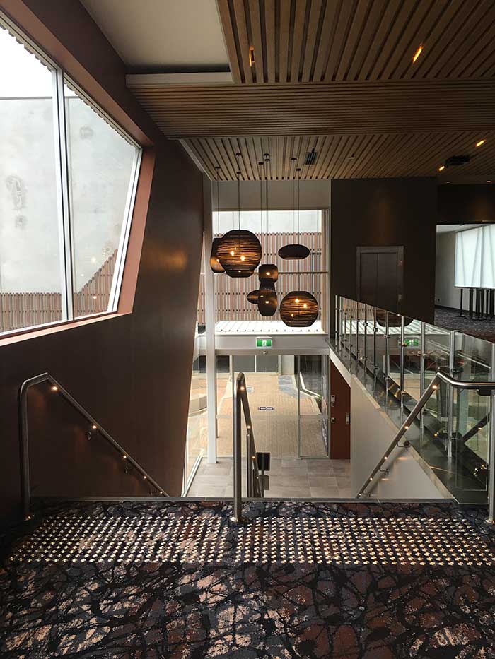 Innowood lining in film house entry